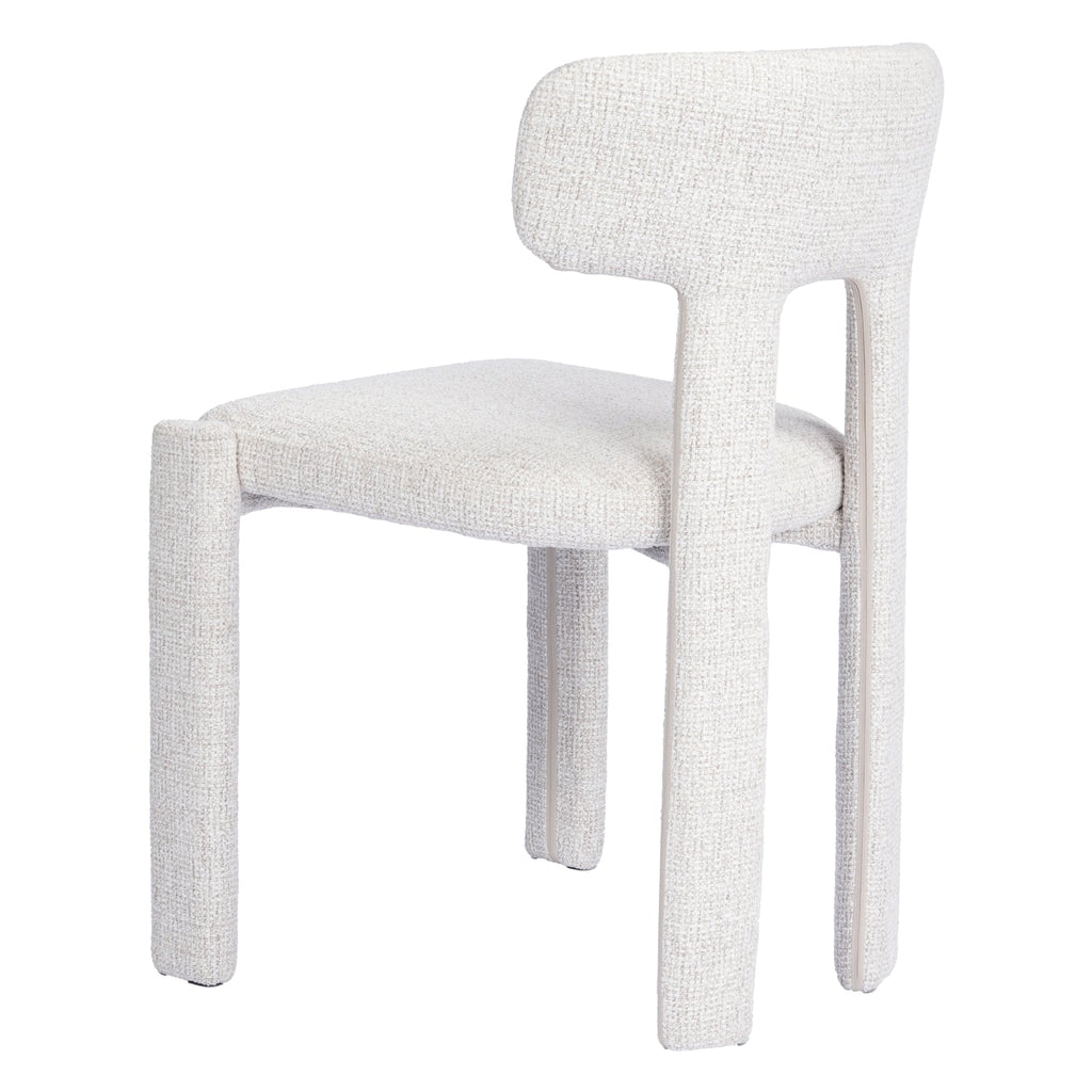 Chaise de salle à manger minimaliste et rembourrée, aux lignes épurées et courbes douces