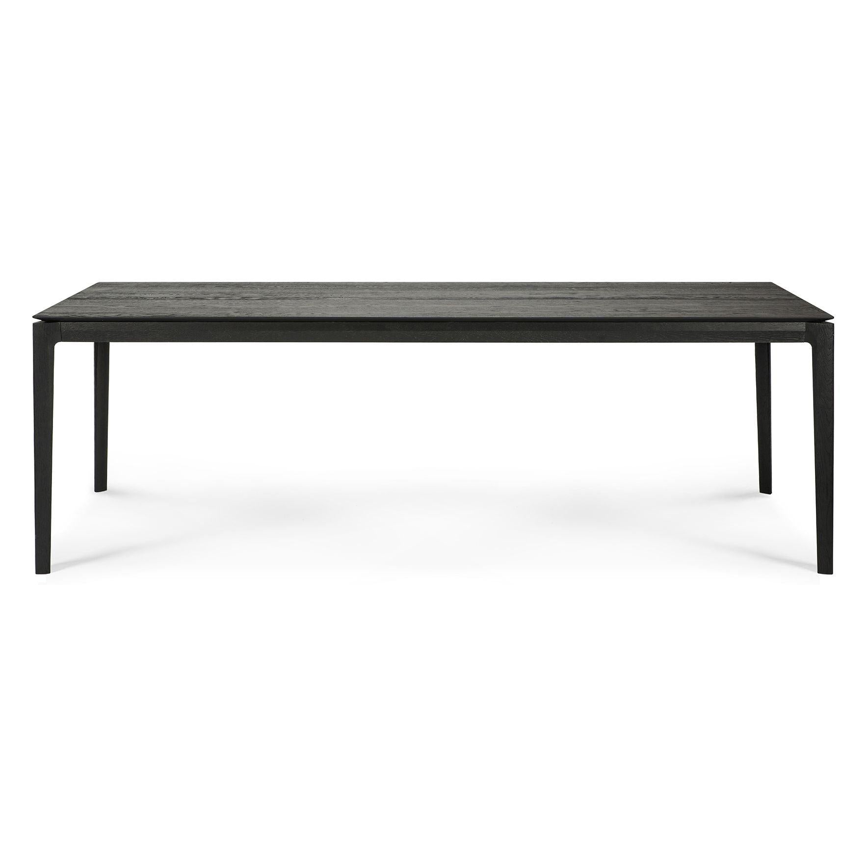 Table de salle à manger intemporelle en chêne massif avec cadre aéré et ouvert