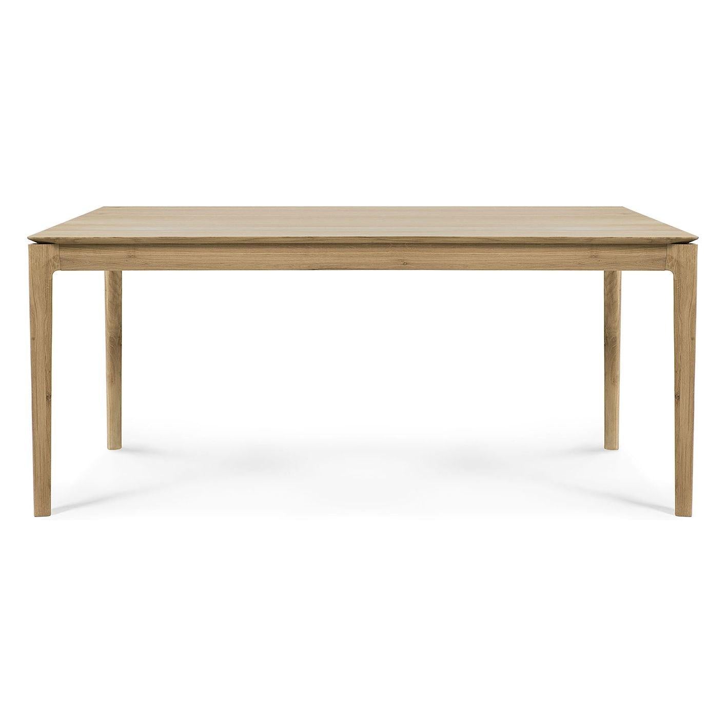 Table de salle à manger intemporelle en chêne massif avec cadre aéré et ouvert