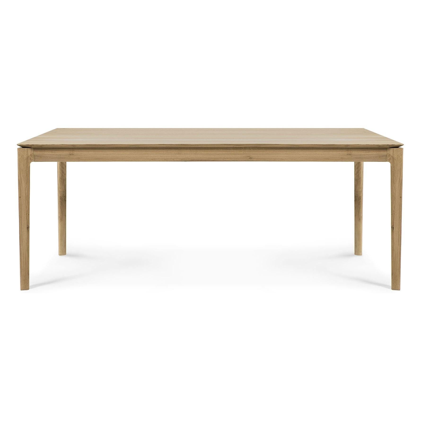 Table de salle à manger intemporelle en chêne massif avec cadre aéré et ouvert