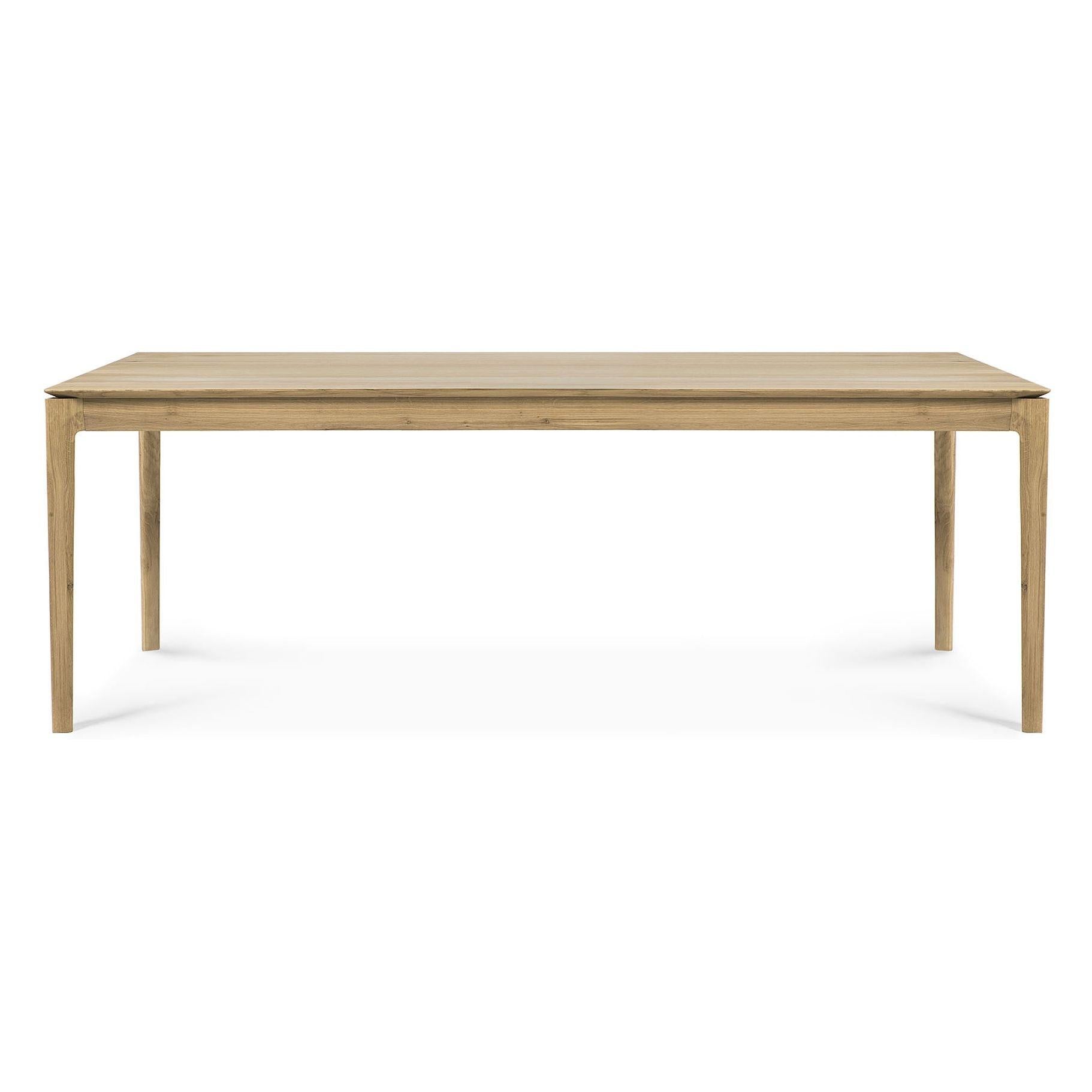 Table de salle à manger intemporelle en chêne massif avec cadre aéré et ouvert
