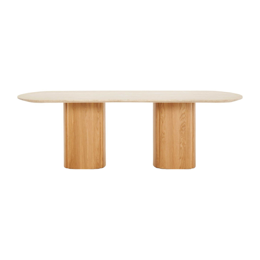 Table à manger ovale sculpturale en travertin avec piètement piédestal aux formes douces pour salles à manger